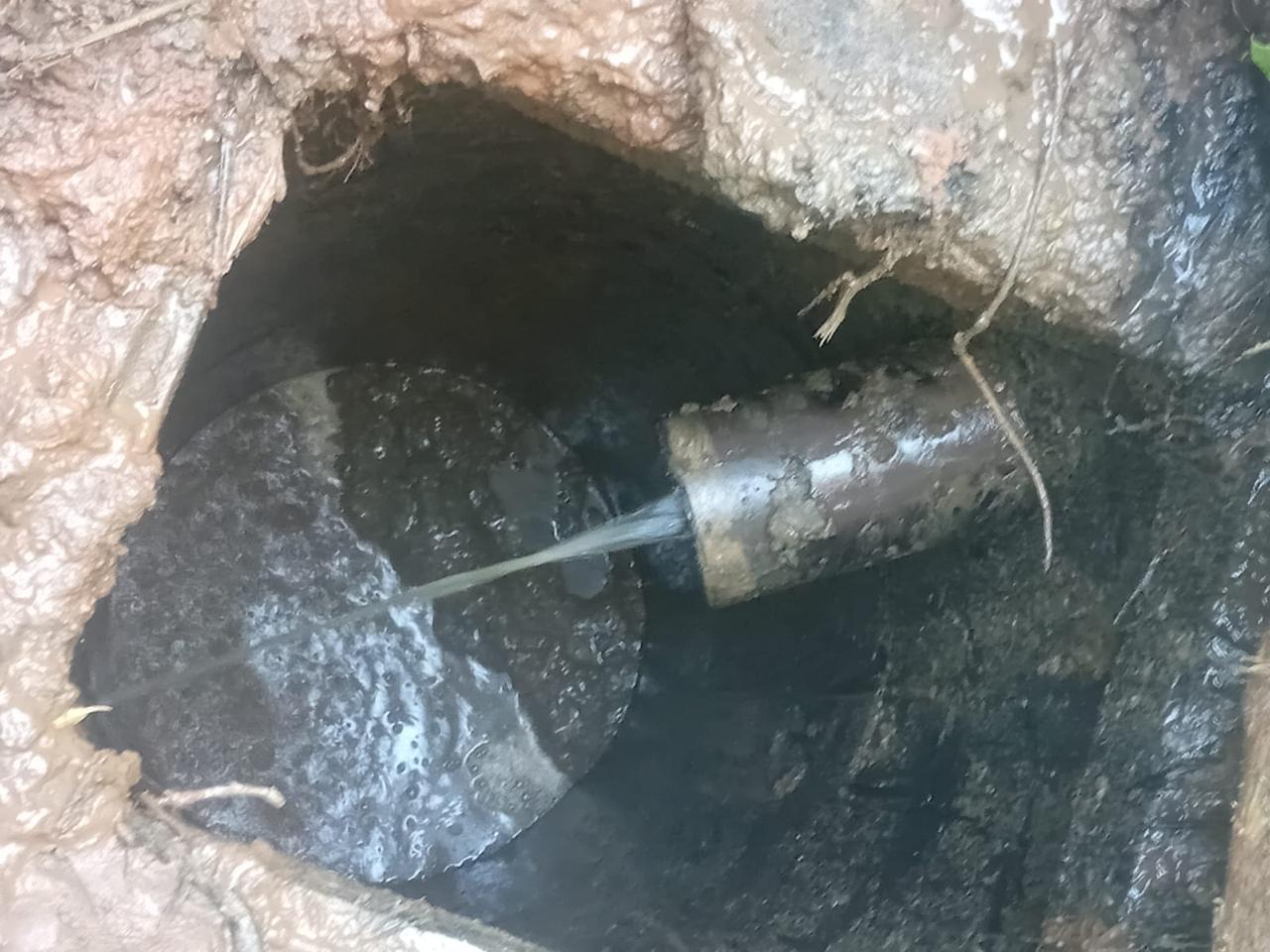 Water being pumped from an underground chamber